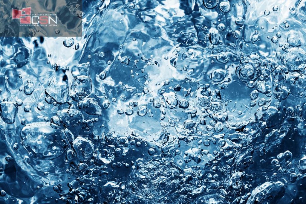 Clean water with bubbles appearing when pouring water